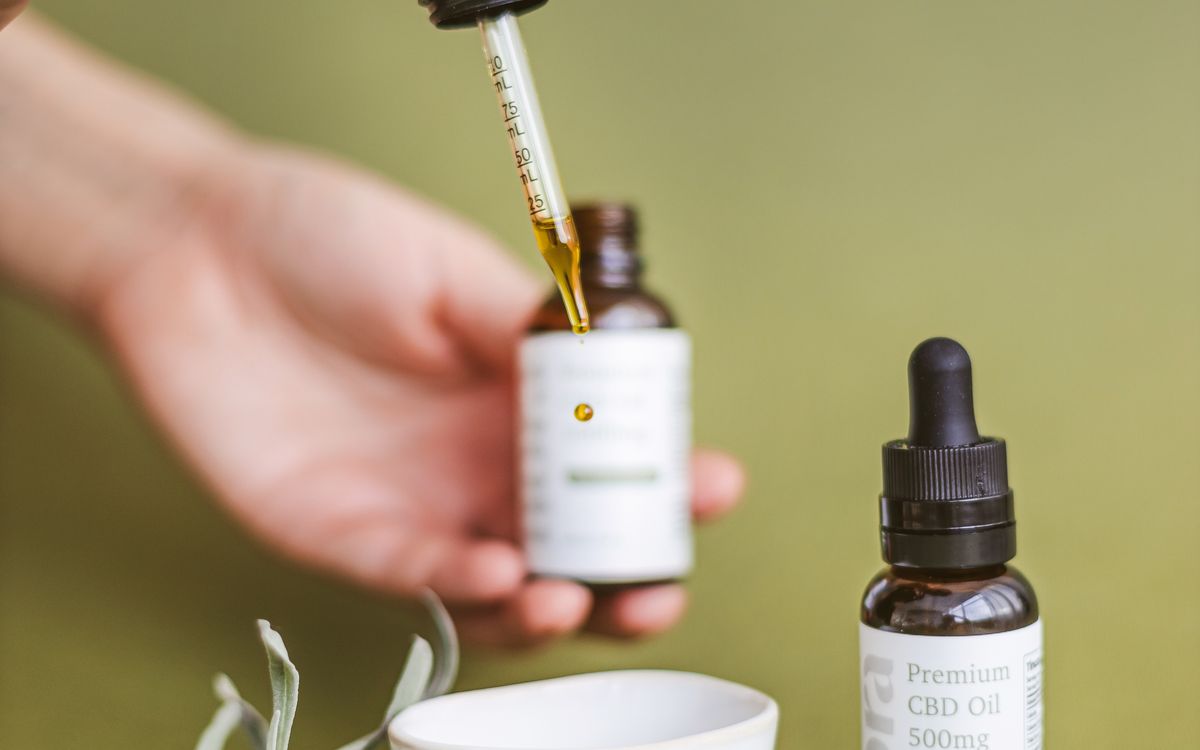 A CBD oil dropper and bottles