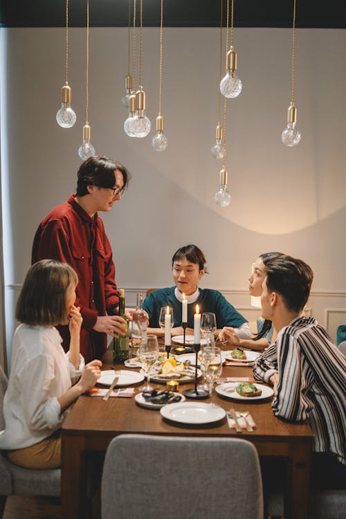 A Group of Friends Having a Dinner Together