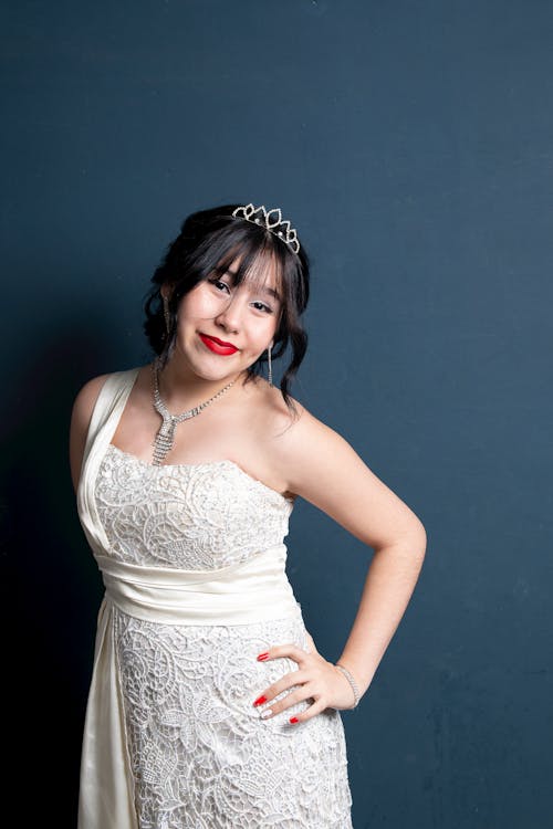 A Woman Wearing a White Dress and a Tiara