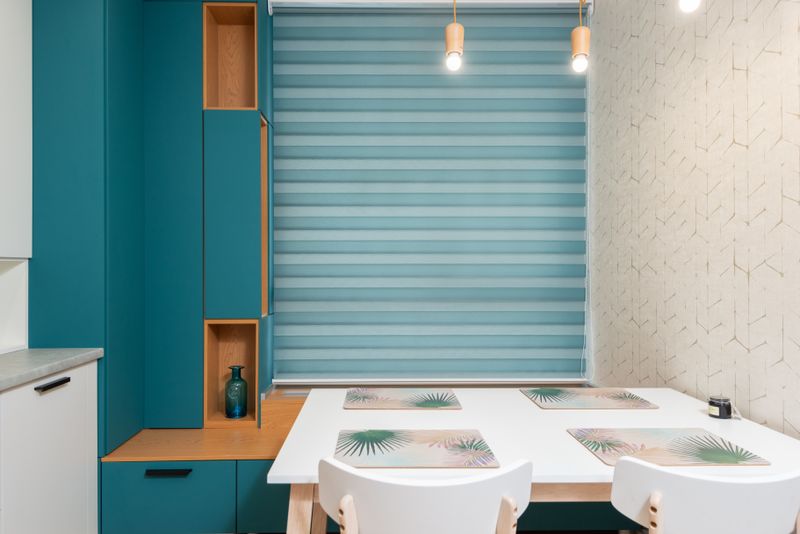Sage Grey zebra blind in a room