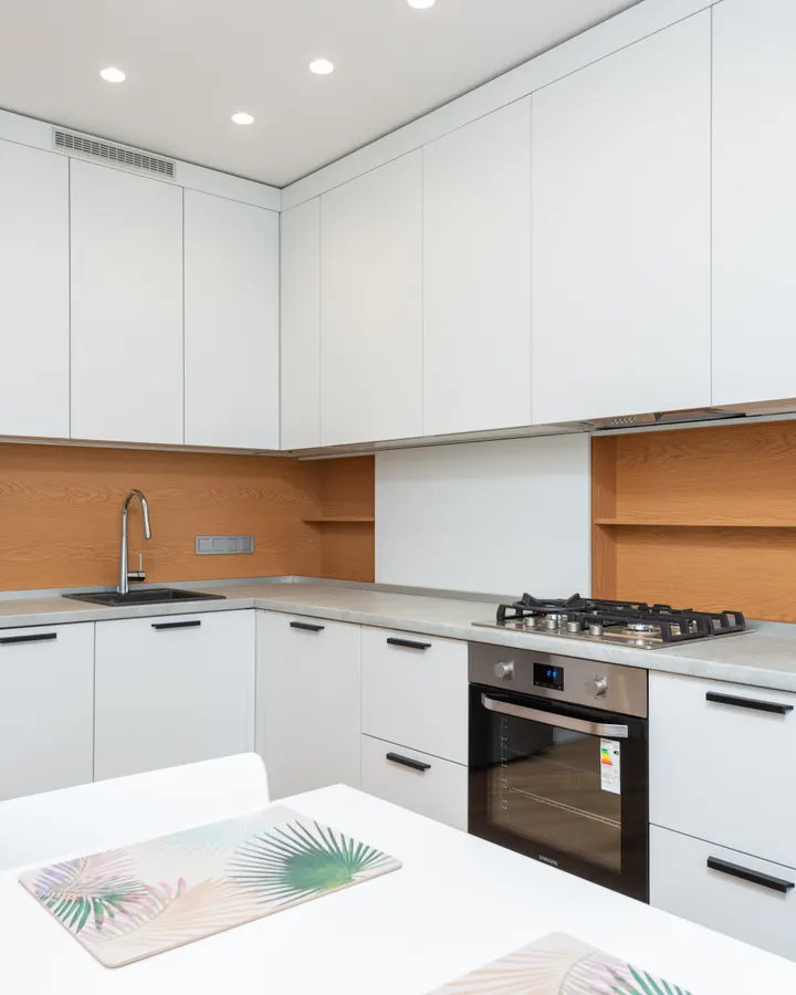 GE refrigerator repair in La Mesa, CA Contemporary kitchen with gas stove, oven and refrigerator, GE refrigerator repair in La Mesa