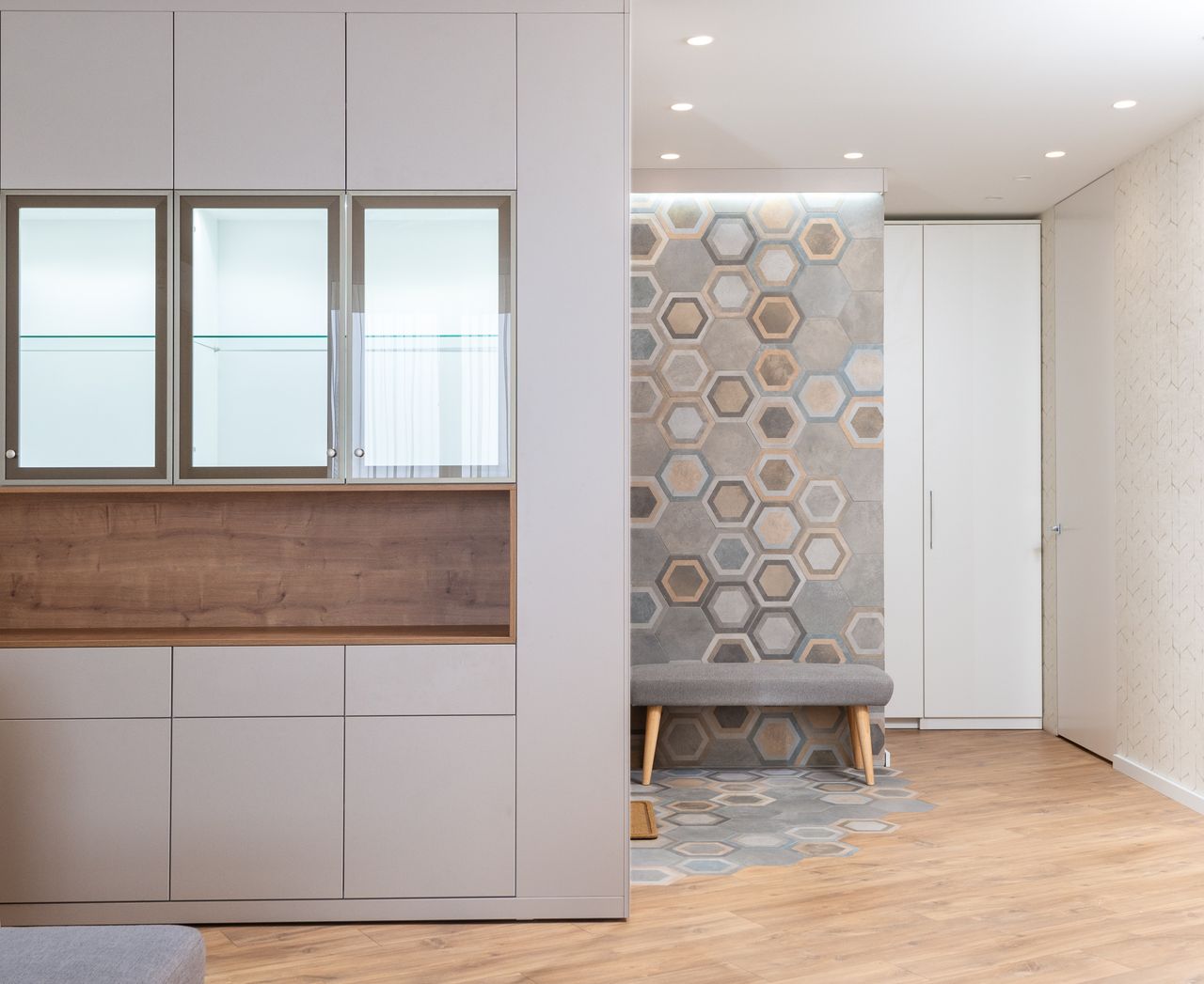 A fitted entry with a bench and hanging space