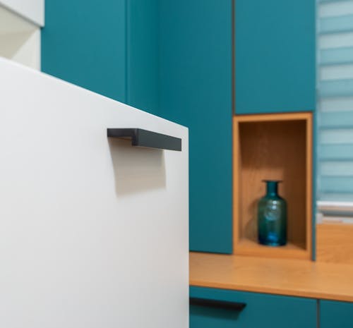 Free Drawer against cabinet and vase in modern kitchen Stock Photo