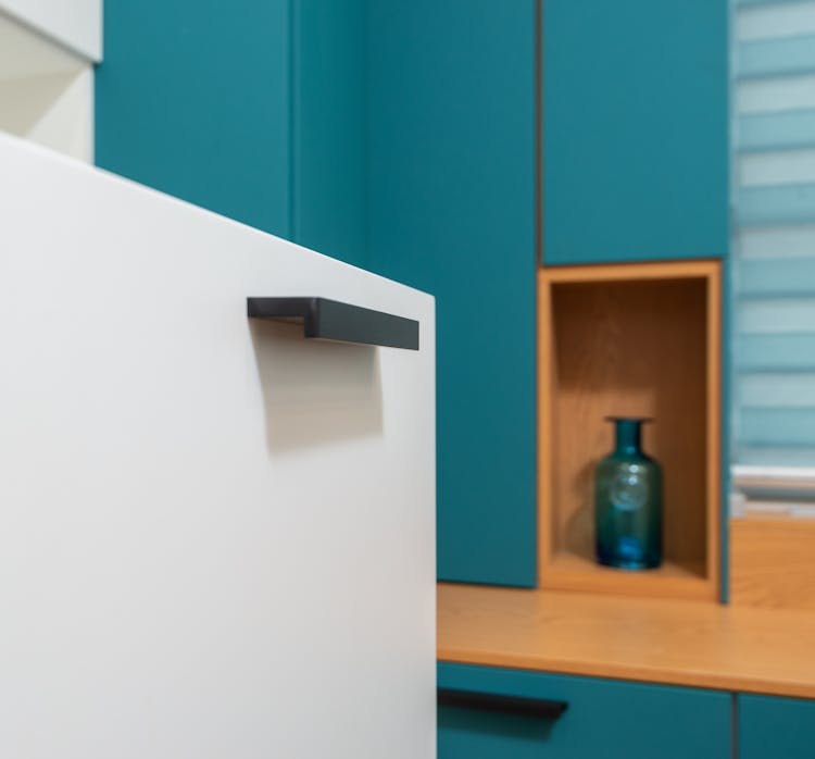 Drawer Against Cabinet And Vase In Modern Kitchen