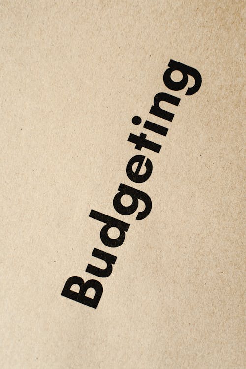 Close-Up Shot of a Budgeting Text on an Envelope