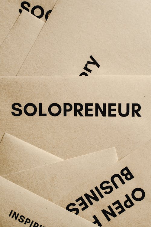 Close-Up Shot of a Solopreneur Text on an Envelope