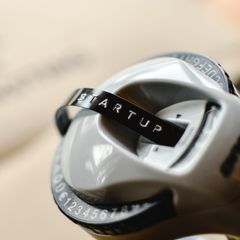 A handheld label maker with a freshly made label