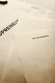 Close-up of micropreneur paperwork representing startup business and entrepreneurship.