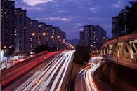 An Aerial Photography of City Buildings Near the Road at Night