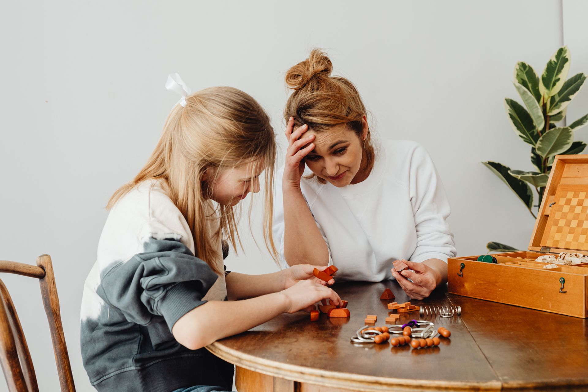 Women Playing Puzzle Games