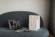 A Macbook Pro on a Couch