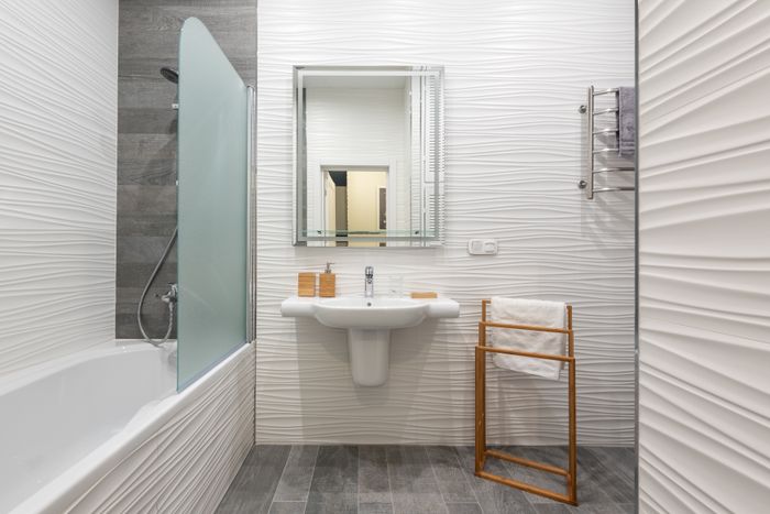 Contemporary bathroom with new tub and washbasin