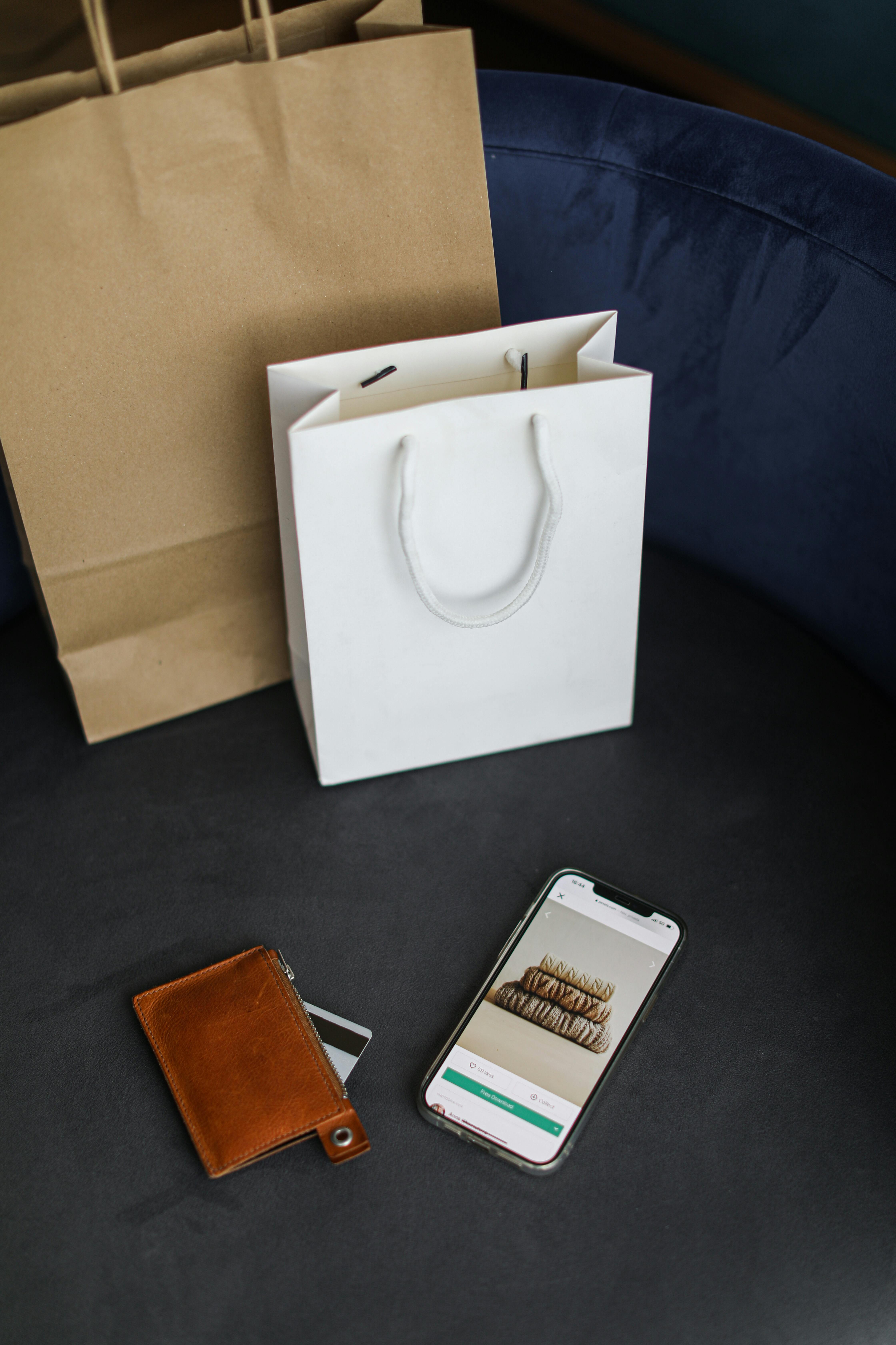 shopping bags wallet and smartphone