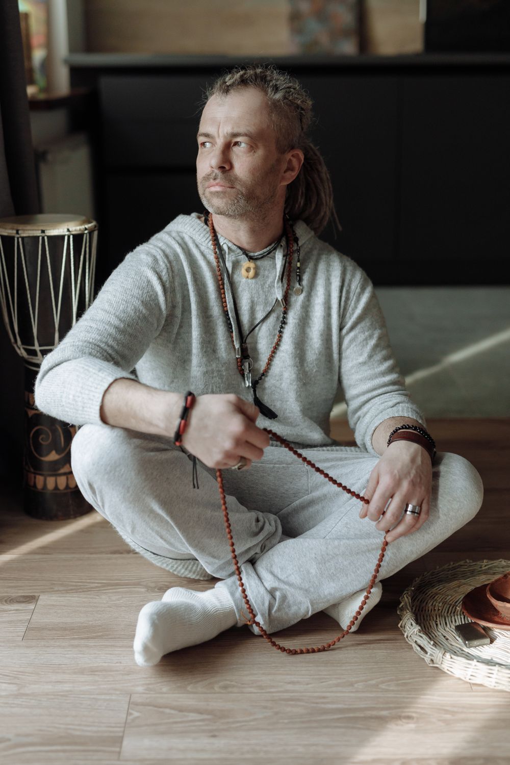 A Man Holding Prayer Beads · Free Stock Photo