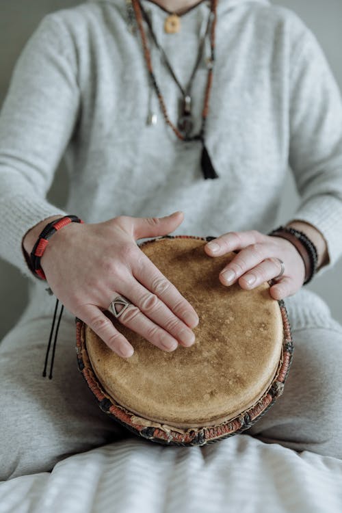 Free Close Up Photo of Person Playing Djembe Stock Photo
