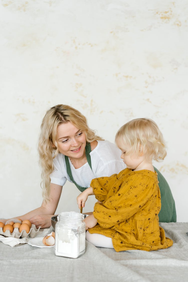 Mother And Child Baking Together