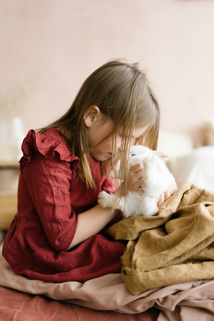 A Girl With Her Pet Bunny