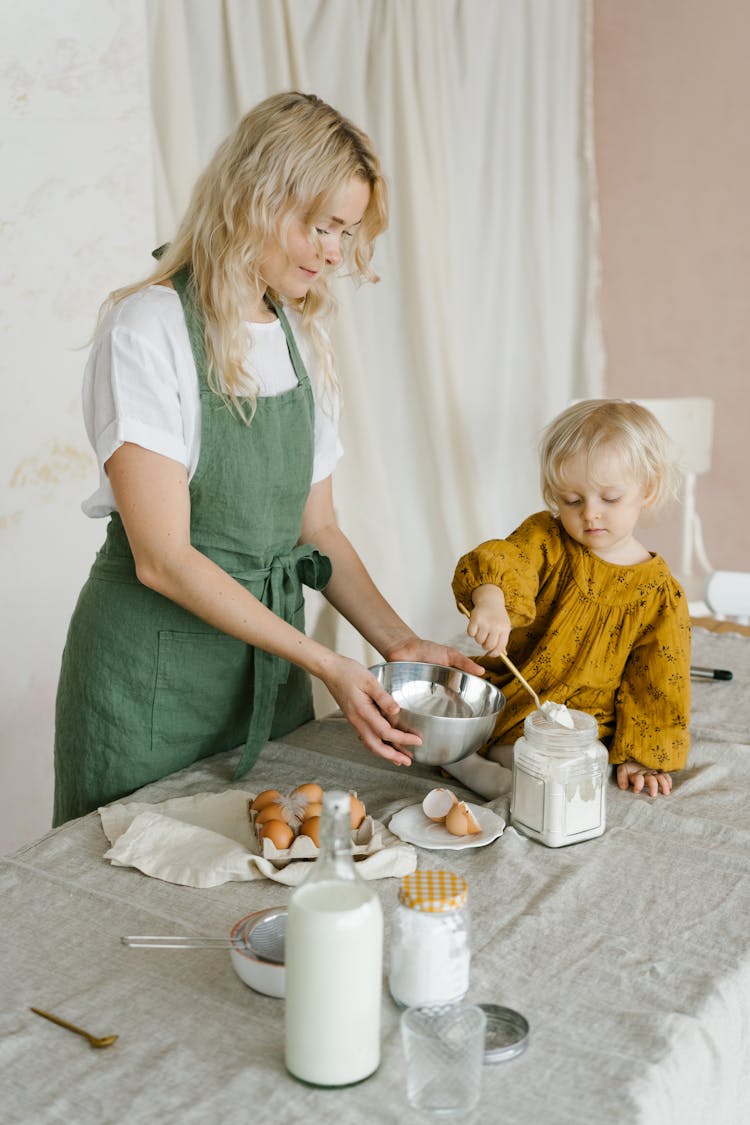 Mother And Child Baking Together