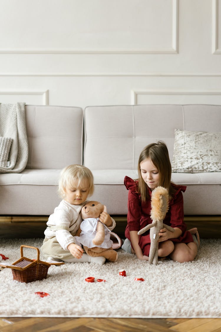 Photograph Of Girls Playing With Toys