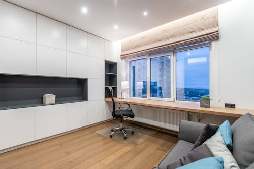 Modern room with couch and cupboard