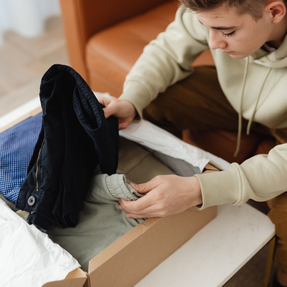 Locking — professional packers wrapping and boxing belongings