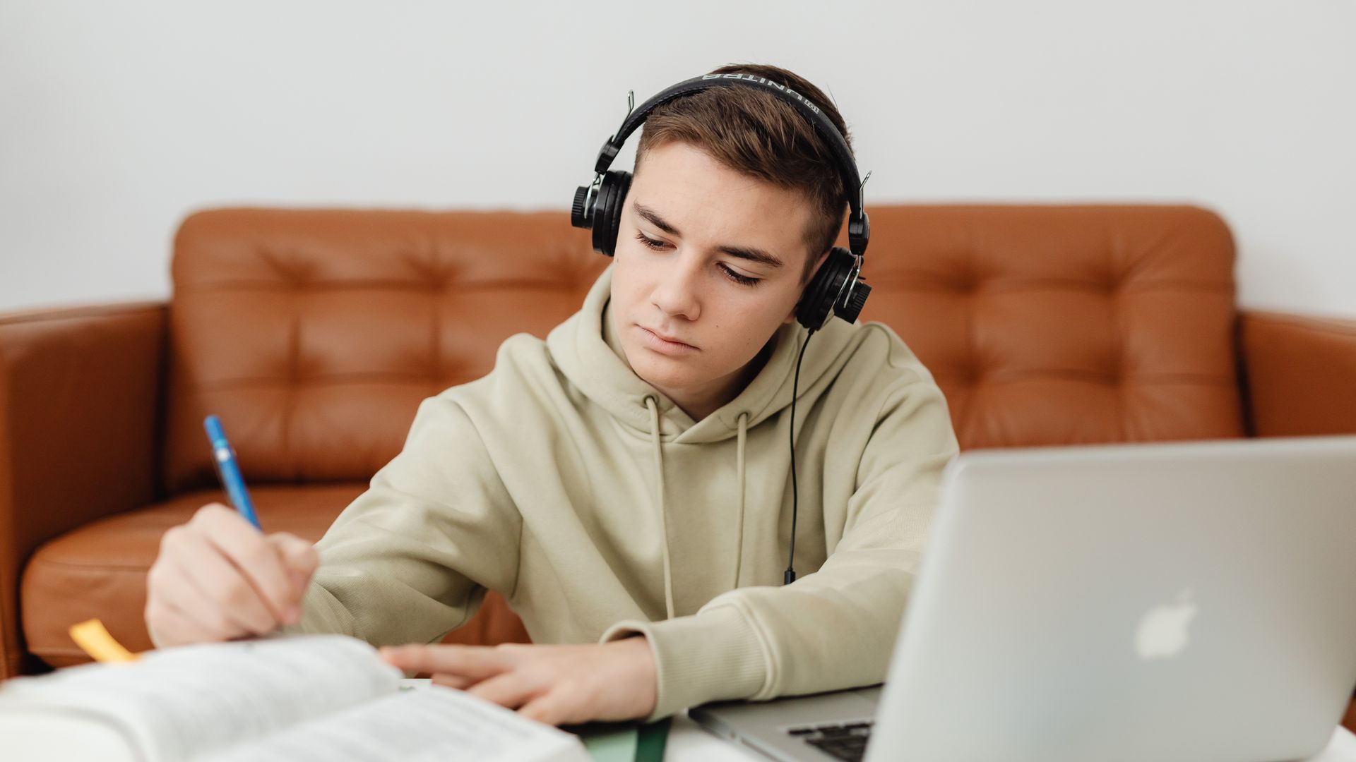 How to Increase Focus for Studying: Proven Strategies for Success Teenage boy with headphones, focused on studying, using a laptop indoors — how to increase focus for studying