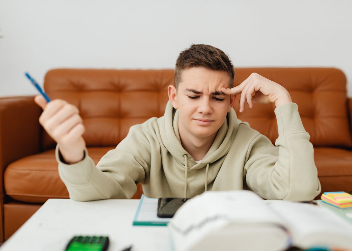 A child doing homework at a desk