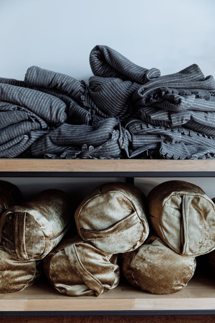 Clothes On Wooden Shelves