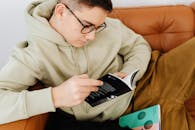 Fine Looking Young Man Reading a Book