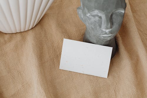 White Card on Brown Table