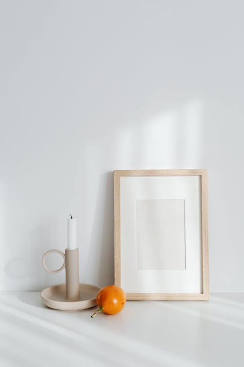 Free White Wooden Frame Mirror on White Wall Stock Photo