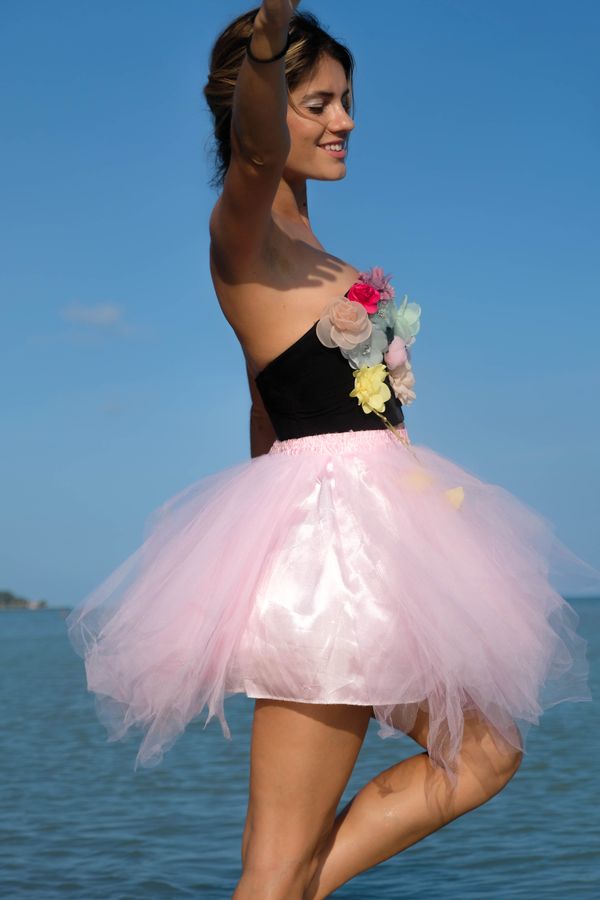Hot pink tutu skirt with black bustier 80s party outfit