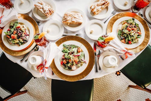 Top View of a Table with Salads and Desserts 