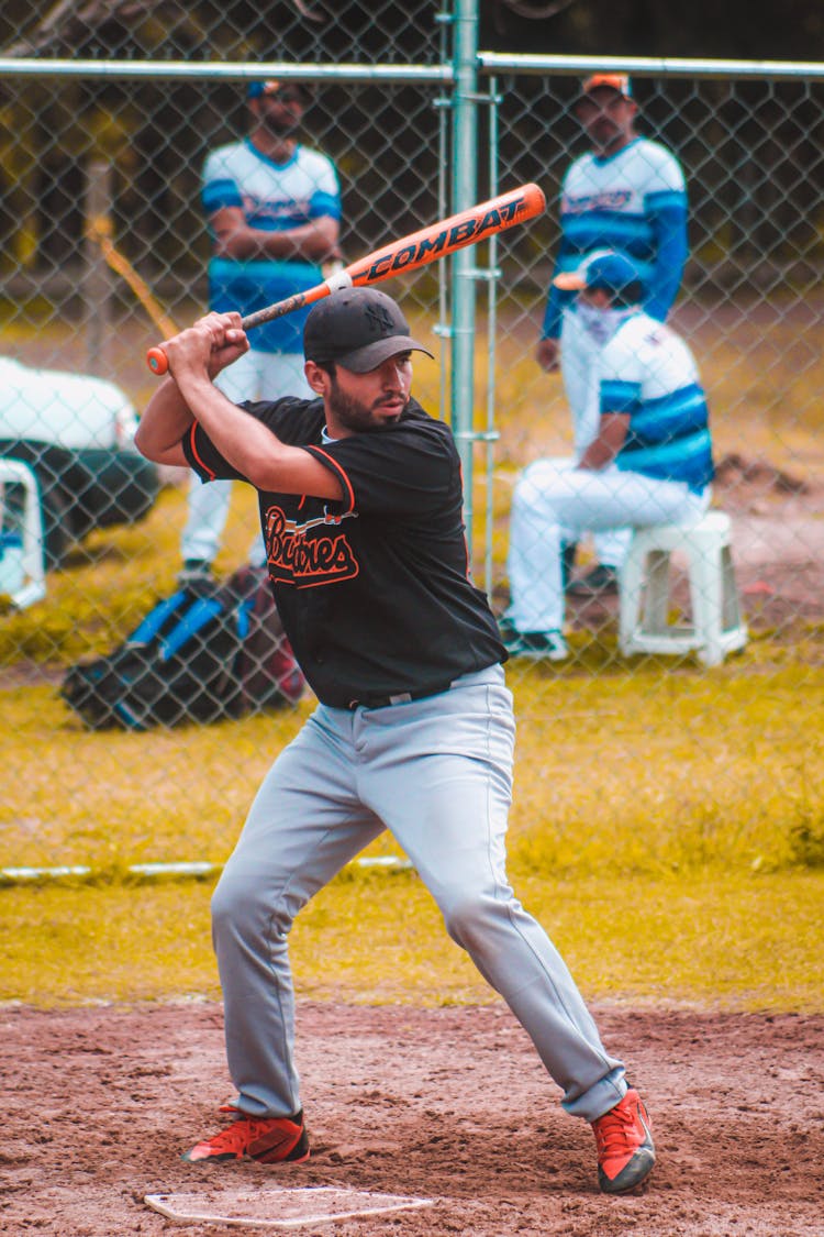 Man Playing Baseball