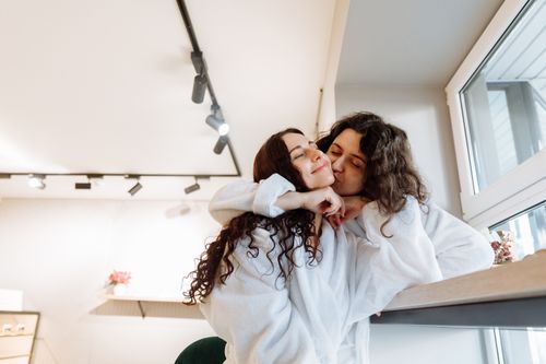 Free Happy couple shares intimate moment in cozy indoor setting, exuding warmth and closeness. Stock Photo