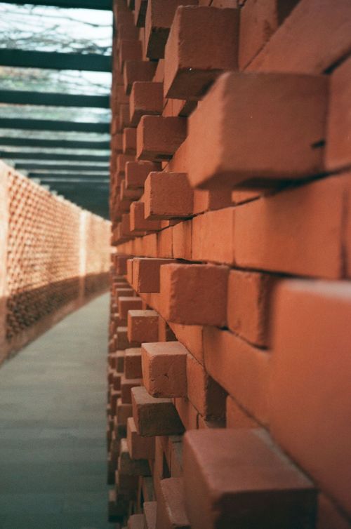 Free Close-up view of a unique brick wall creating an architectural pattern in Jakarta. Stock Photo