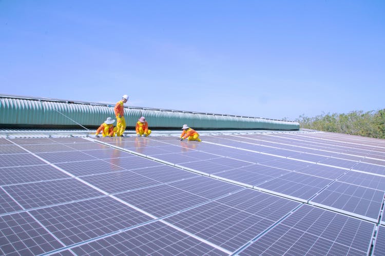 Solar Technicians Installing Solar Panels