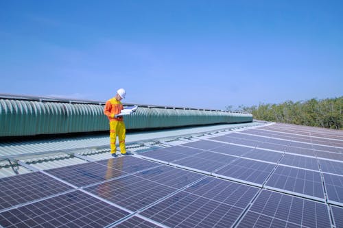 Solar Technician Installing Solar Panels