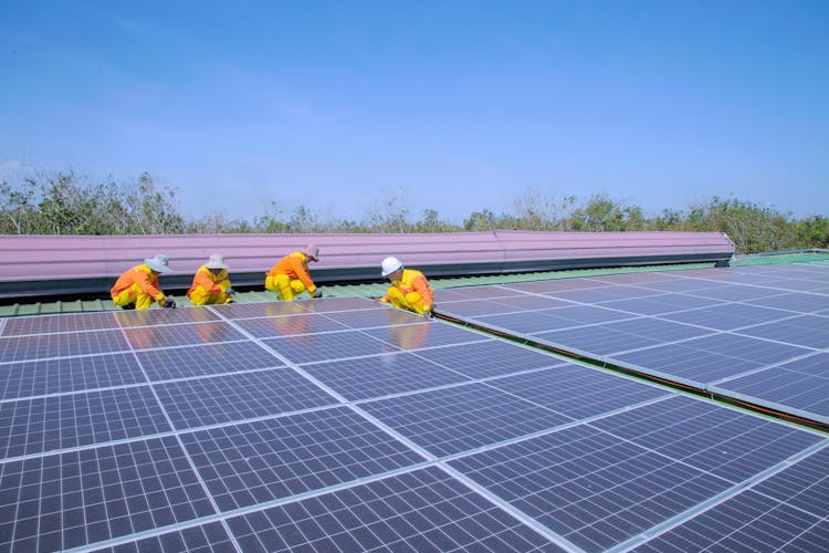 Solar Technicians Installing Solar Panels