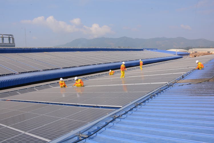 Solar Technicians Installing Solar Panels