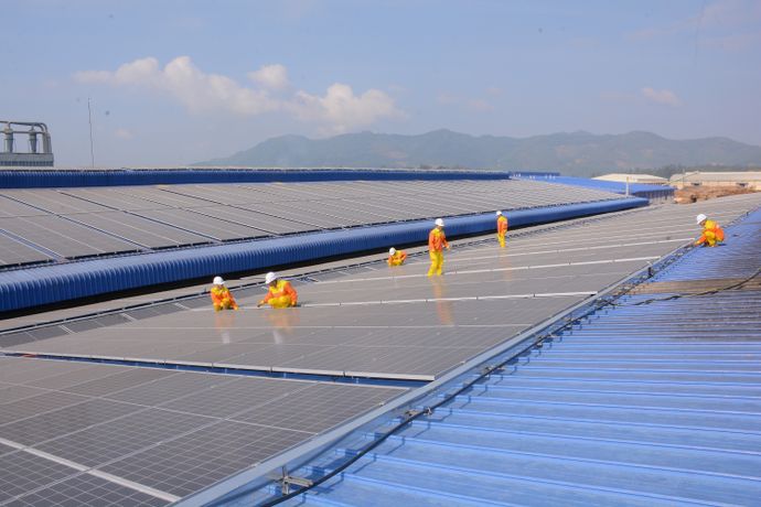 Large solar array installed on a commercial building roof