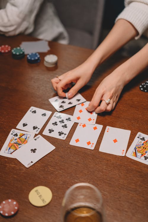 Free Person Holding Playing Cards Stock Photo