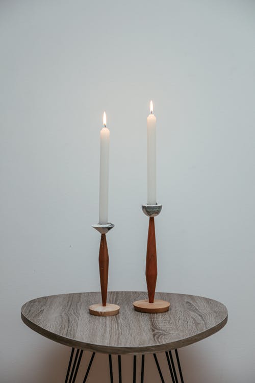 Free Lit Candles on a Wooden Table Stock Photo