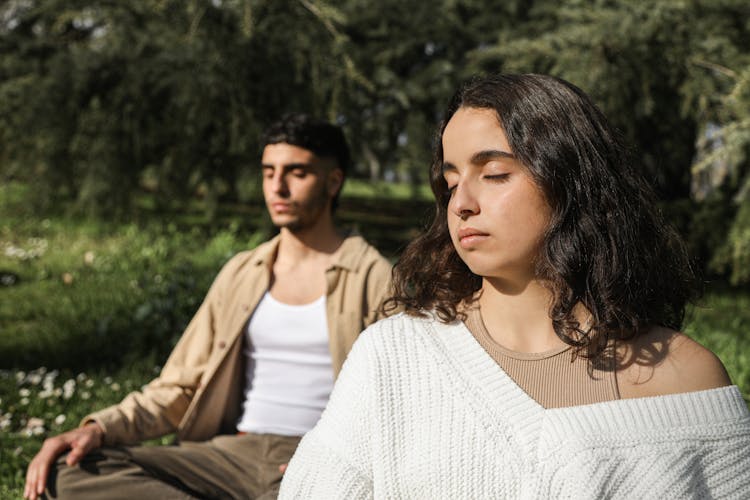 Photo Of A Man And Woman While Closed Eyes