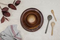 Brown Wooden Round Bowl on White Textile