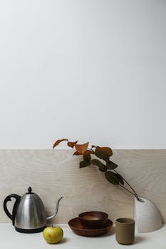 Minimalist kitchen scene showcasing rustic elements and simple design.