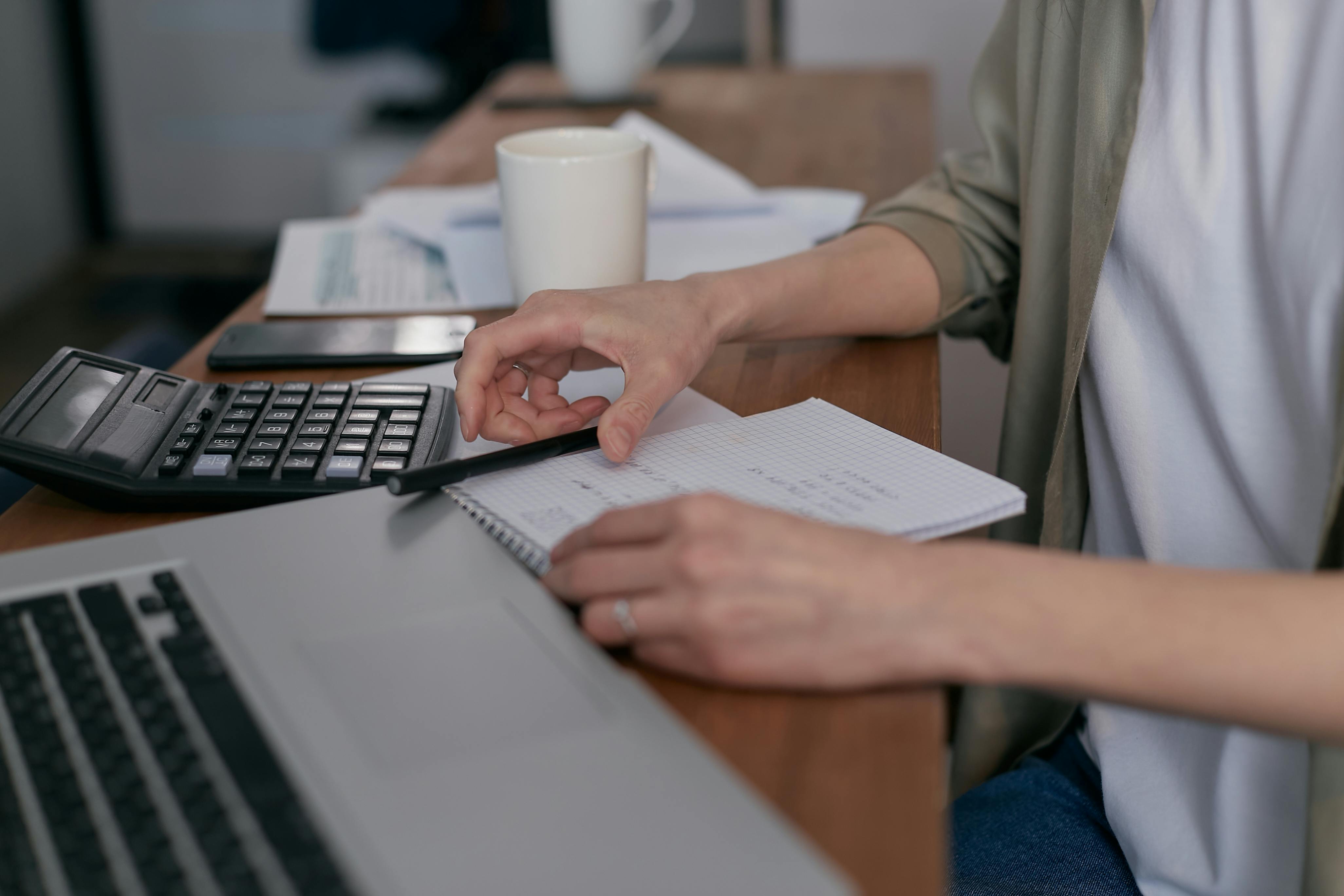 Person Holding White Printer Paper · Free Stock Photo