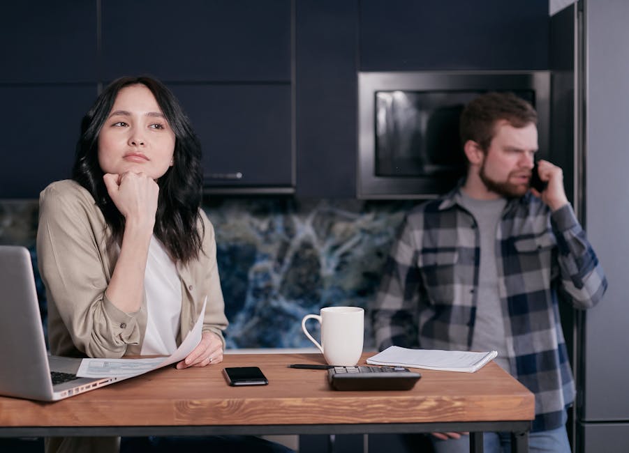 couple working together on a conflict resolution worksheet - conflict resolution marriage counseling