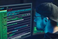 Man in Blue Crew Neck Shirt Wearing Black Framed Eyeglasses