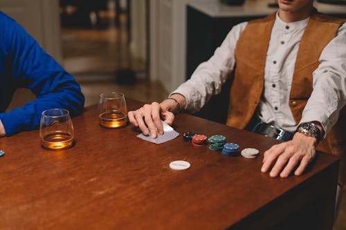 Person Looking at His Cards